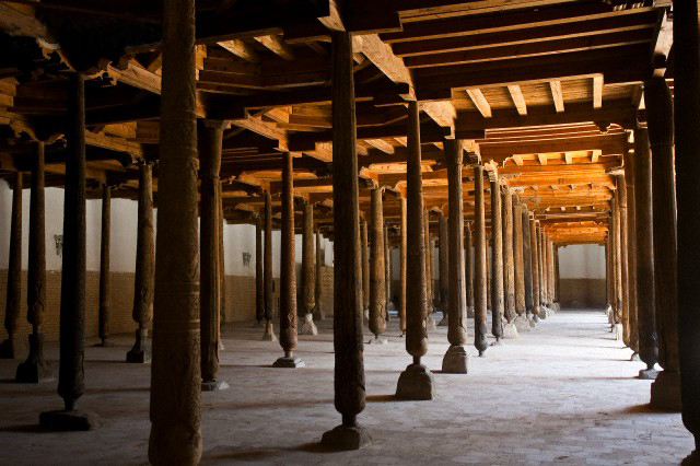 Uzbekistan, Khiva, walled city of Itchan Kala, listed as World Heritage by UNESCO, finely chiselled colonnade of Juma Masjid Mosque
