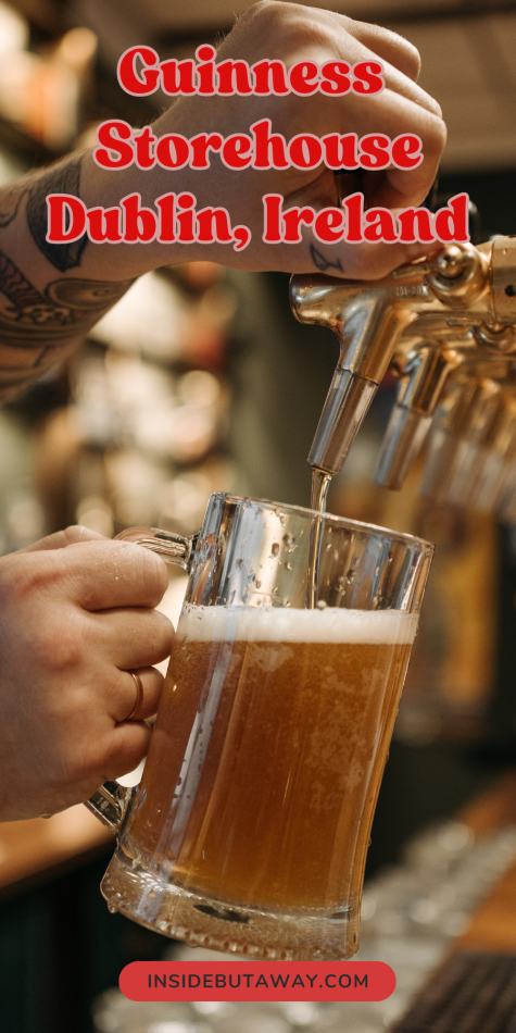man pouring beer at the Guinness Storehouse